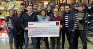 Cheque Presentation 4644 copy scaled e1676376640636 TuffStuff Workwear donates thousands to children’s hospice