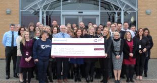 Dimensions Cheque for CRUK Dimensions raises £37,000 for charity