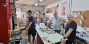 Maintenance Engineer Stanislav Zapryanov left with guest sock engineers Jonathan Pears center and Andrew Thompson right from England e1721032884918 Kingly transforms sock knitting offcuts into practical doorstops
