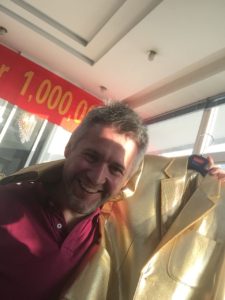 Merchandise director, Ian McLaverty, with a Gold Blazer presented from the Eco-blazer’s manufacturers to mark the achievement