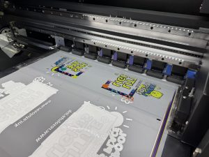 Pic 2 small reg mark in black this is all automated sheet slitters require to detect where to slit Revolutionising DTF printing