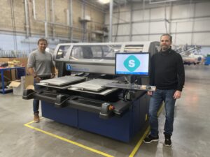 Screenworks Alan Porter operations director left Tommy Newton production manager right Screenworks increases its agility with the Kornit Avalanche HD6