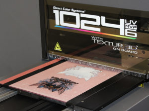 A digitally printed heat seal transfer with white ink