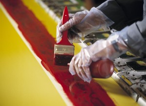Screen adhesive being applied