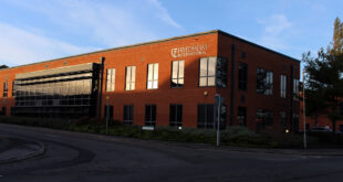 setting sun web Friedheim installs new signage on new premises